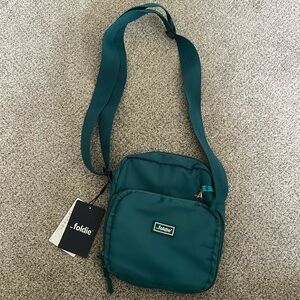 The Foldie Sling Bag Teal Color (New with Tags)